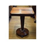 A William IV rosewood occasional table, on a circular platform base, 55 cm wide,