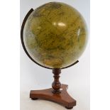 A Cruchley's New Terrestrial Globe, on a mahogany stand, some damage,