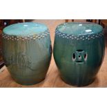 A pair of Chinese pottery green glazed barrel garden seats,