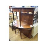 A mahogany D end dining table, inset two extra leaves, on tapering square legs,