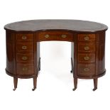 An Edwardian inlaid mahogany kidney shaped desk,