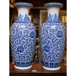 A pair of Chinese blue and white porcelain vases, decorated stylised foliage,