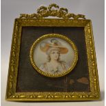 English school, 19th century, a circular bust portrait miniature of a lady,