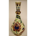 A Zsolnay Pecs baluster shape vase, with floral decoration, two rim chips,