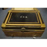 A 19th century Allibhoy Vallijee & Sons black and gold painted metal dispatch box, initialled CTR,