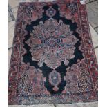 A Persian medallion rug,