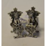 Two novelty silver chairs, with cats on each seat,