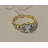 A 9ct gold blue topaz and diamond ring, approx.