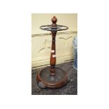 A Victorian style mahogany stick stand, with a turned column,