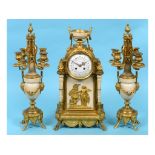 A French clock garniture, the clock having an 11 cm diameter enamel dial,