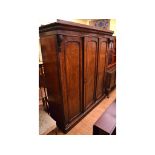 A Victorian mahogany three door wardrobe,