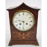 An Edwardian mantel clock, the 11.