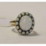 A 9ct gold and Gilson opal cluster ring, approx.