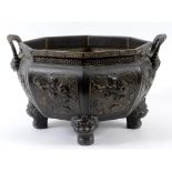 A Japanese bronze octagonal jardiniere,