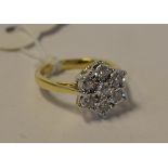 A 9ct gold and diamond flowerhead ring,