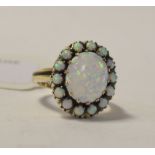 A 9ct gold and Gilson opal cluster ring,