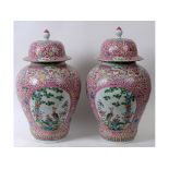 A pair of large Chinese famille rose vas