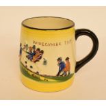 A Watcombe Widdicombe Fair mug, an Iznik mug,