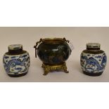 A pair of Chinese porcelain ginger jar and covers, decorated dragons, 15 cm high,