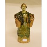 An Italian pottery figure, of a water carrier,