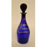 A 19th century blue glass decanter and stopper, Brandy,