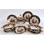 A 19th century porcelain dessert service, comprising a sugar bowl and cover, a pair of baskets,