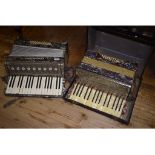 A Geraldo accordion, and another similar