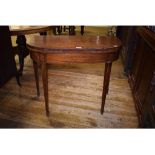 A George III inlaid mahogany tea table,