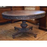 A Colonial padouk wood centre table, the