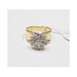 A 14ct gold and diamond cluster ring, in