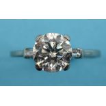 A platinum and solitaire diamond ring, w