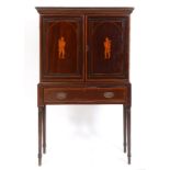 A 19th century mahogany cabinet on stand