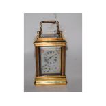 A miniature brass carriage timepiece, de