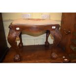 An 18th century style carved walnut stoo