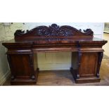 An early Victorian mahogany sideboard, o