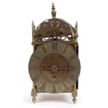A brass lantern clock, the 16.5 cm diame