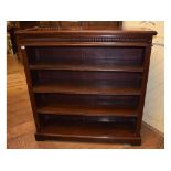 A late Victorian walnut open bookcase, o