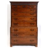 A George III oak chest on chest, the mou