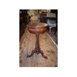 A Victorian rosewood teapoy, lacks inter