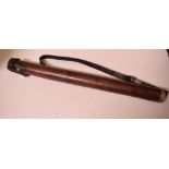 An early 20th century cylindrical leather document carrying tube, with strap,