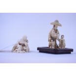 A Japanese carved ivory netsuke, in the