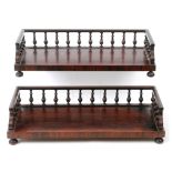 A pair of Regency style rosewood book tr