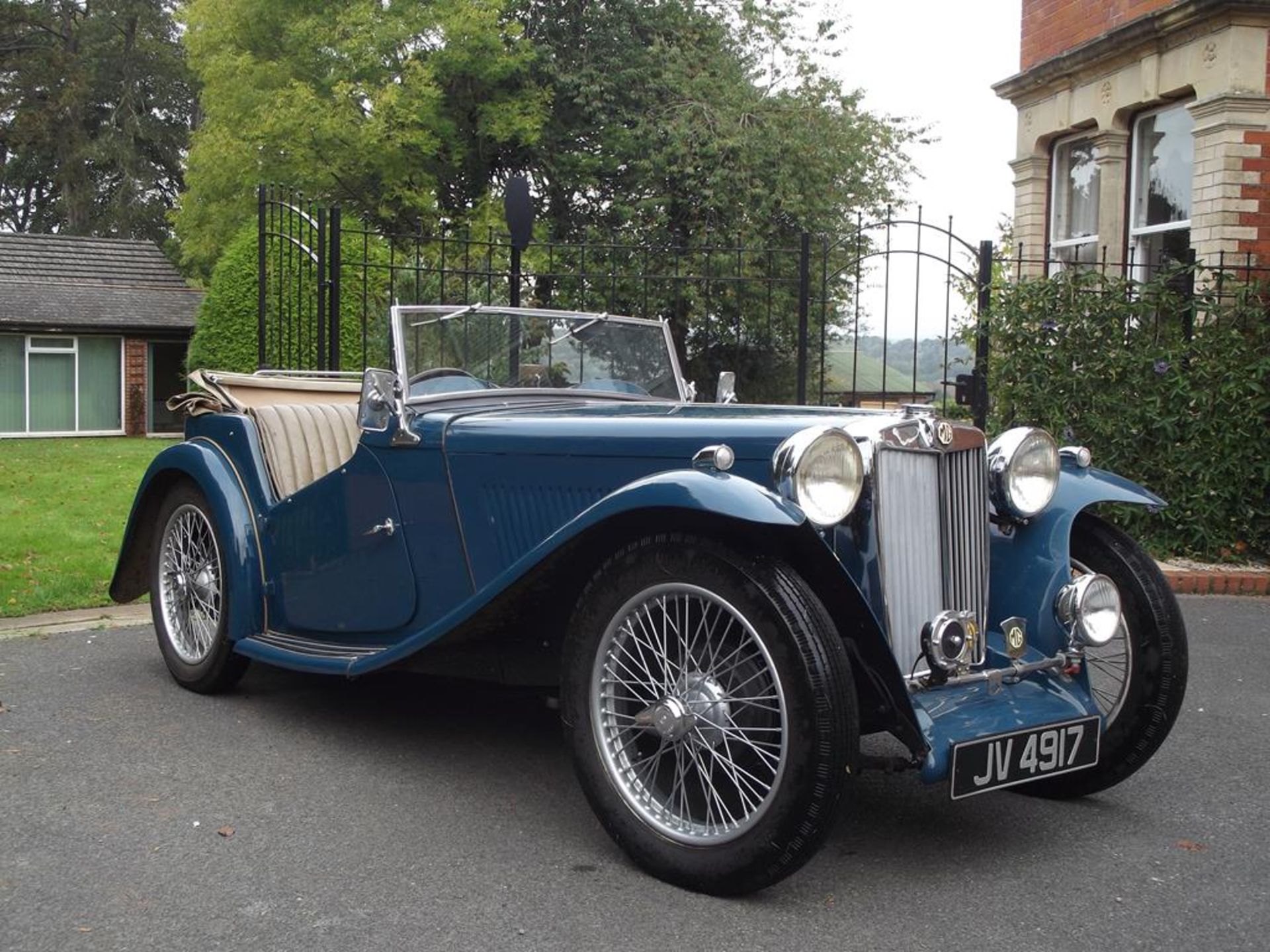 A 1936 MG TA, registration number JV 4917, chassis number TA 0291, engine number MPJM 39011,