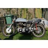 A 1960 Norton Dominator project, registration number 523 MKO, black.