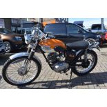 A 1960 Triumph T20 Tiger Cub street scrambler, registration number EAS 276, frame number T64878,