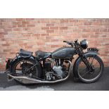 A 1939 Velocette MSS, registration number FXU 52, engine number MSS3944, black.