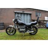 A 1981 Kawasaki KZ550 Limited, registration number JMR 936W, black/silver.