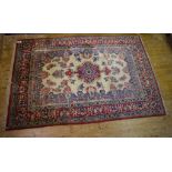 A Persian medallion carpet, decorated fl