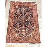 A Bidjar rug, decorated floral motifs,