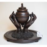 A bronze inkwell, in the form of an urn